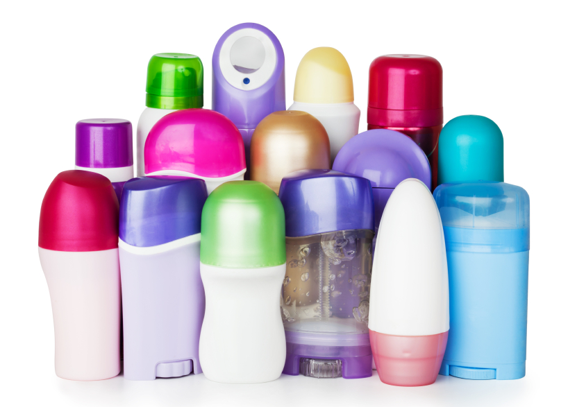 Blank bottles of conditioner, deodorant and bodycare treatment on white background